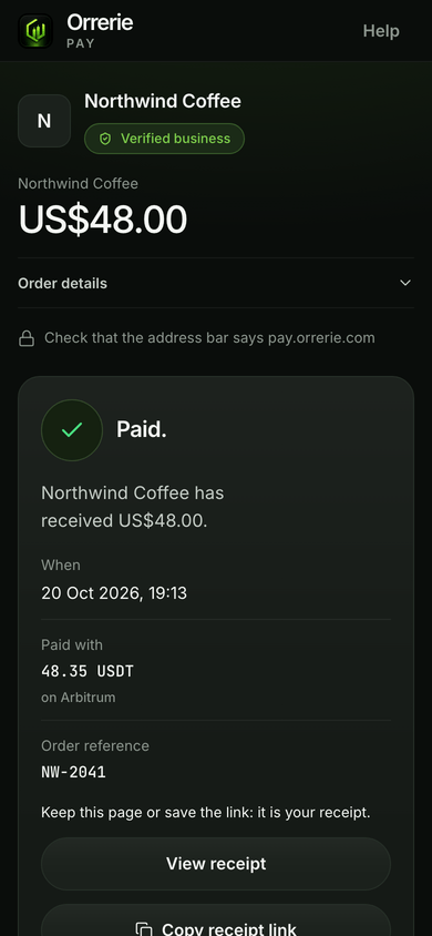 The checkout on a phone after a payment through Relay: Paid with USDT on Arbitrum, and Northwind Coffee has received the full price.