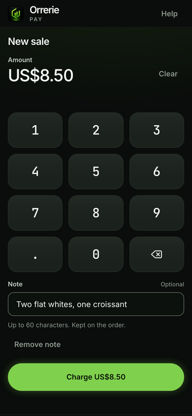 The till on a phone: the keypad, an amount and a note, ready to charge.