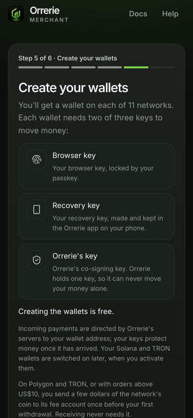 Sign-up on a phone: one passkey approval makes the eleven wallets, each needing two of three keys.