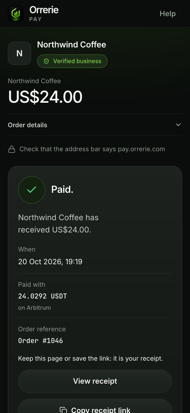 The same shop order paid on a phone: Paid with USDT on Arbitrum, its reference Order #1046.